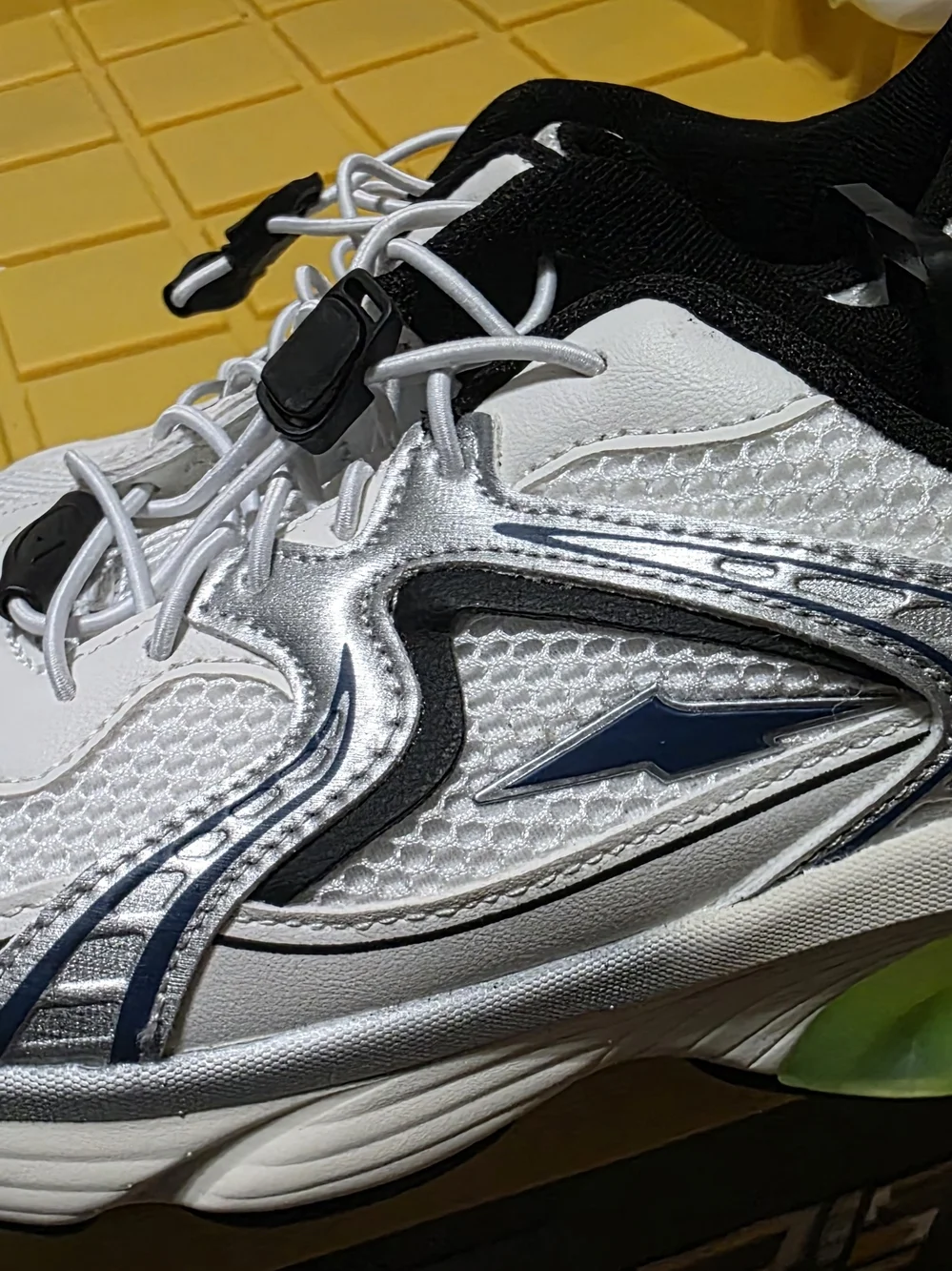 Avia White and Black Athletic Sneakers with Blue Accents